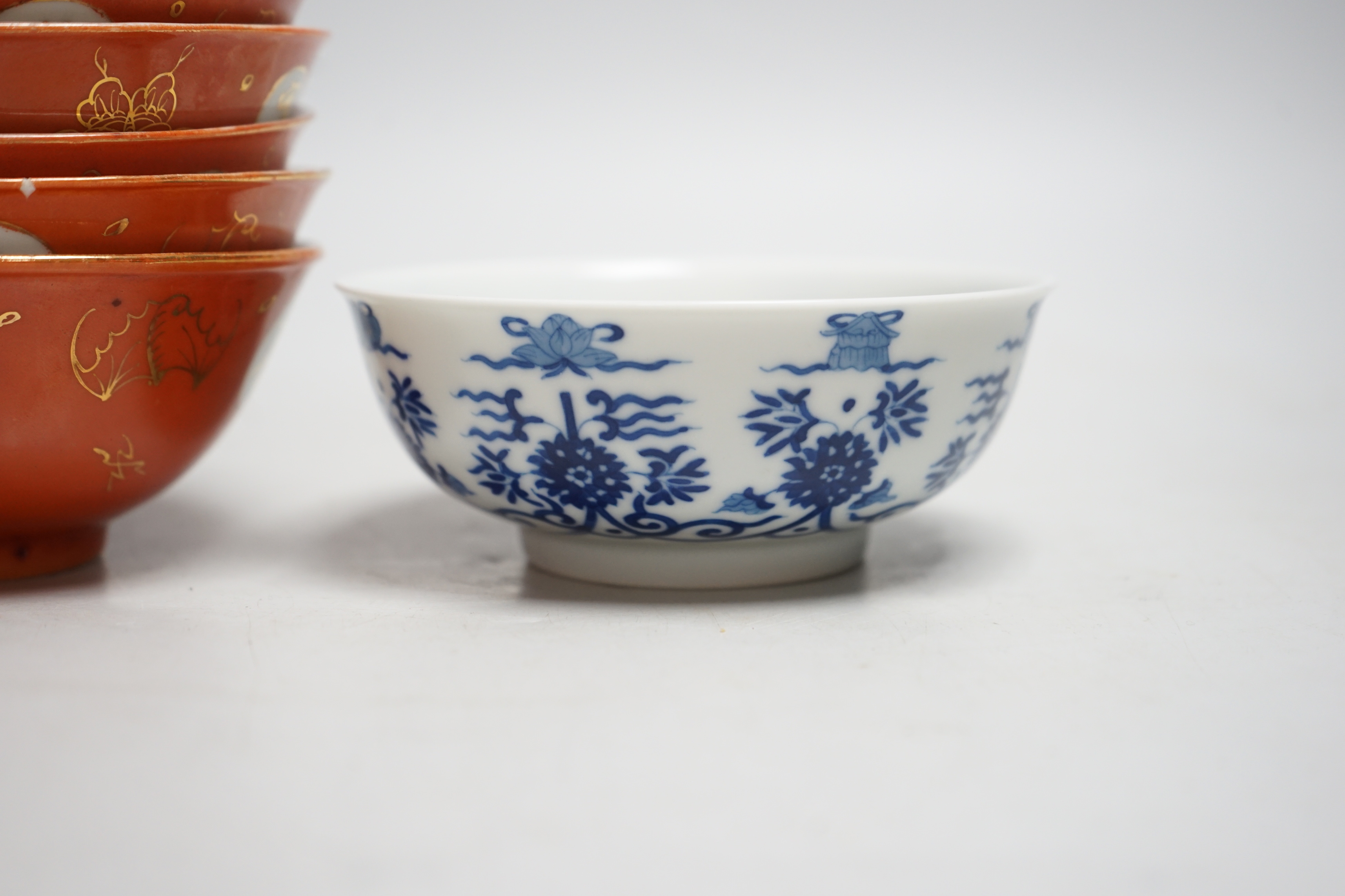 Five Chinese coral ground bowls and a blue and white bowl, 13cm (6)